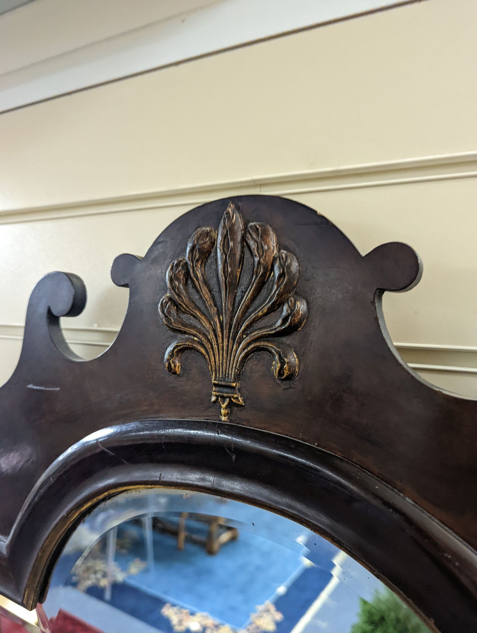An early 20th century George III style parcel gilt fret cut mahogany wall mirror, width 59cm, height 112cm